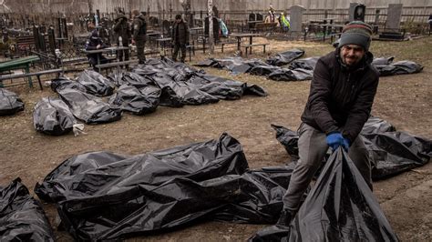 fake dead body in a bag ukraine|Fact check: Clip shows climate protest, not Ukrainian 'crisis actors'.